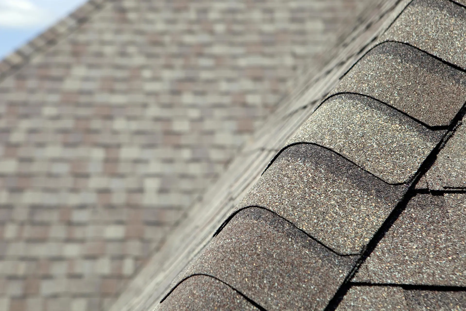 New Roof Cap Leads to Valley and Blurred Shingles